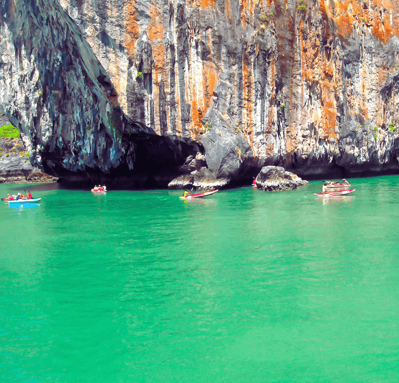 Canoeing around the phang nga sea caves and through the mangrove forests is a must