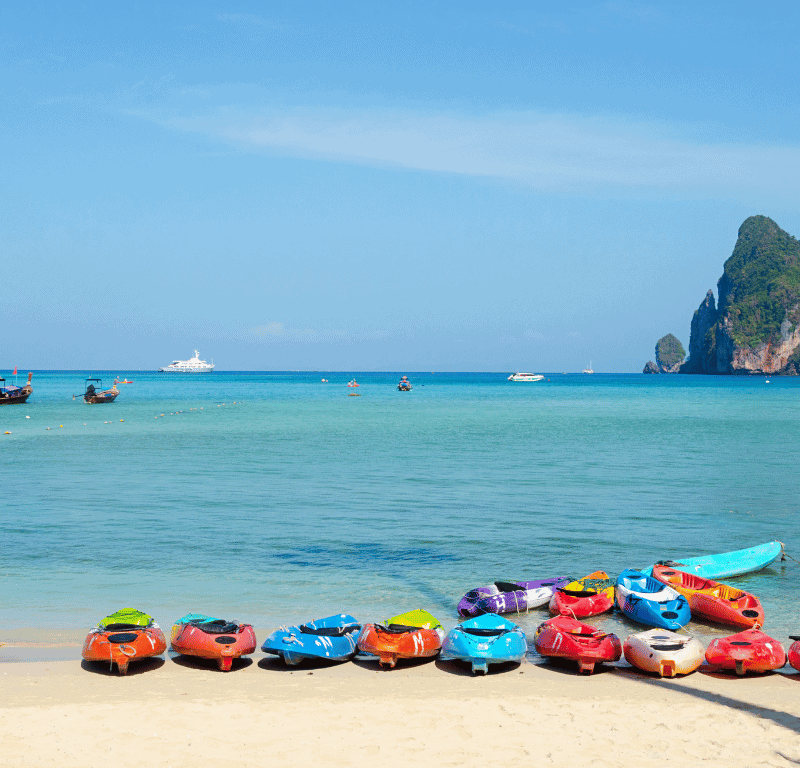 Kayaks parked on long beach phi phi island